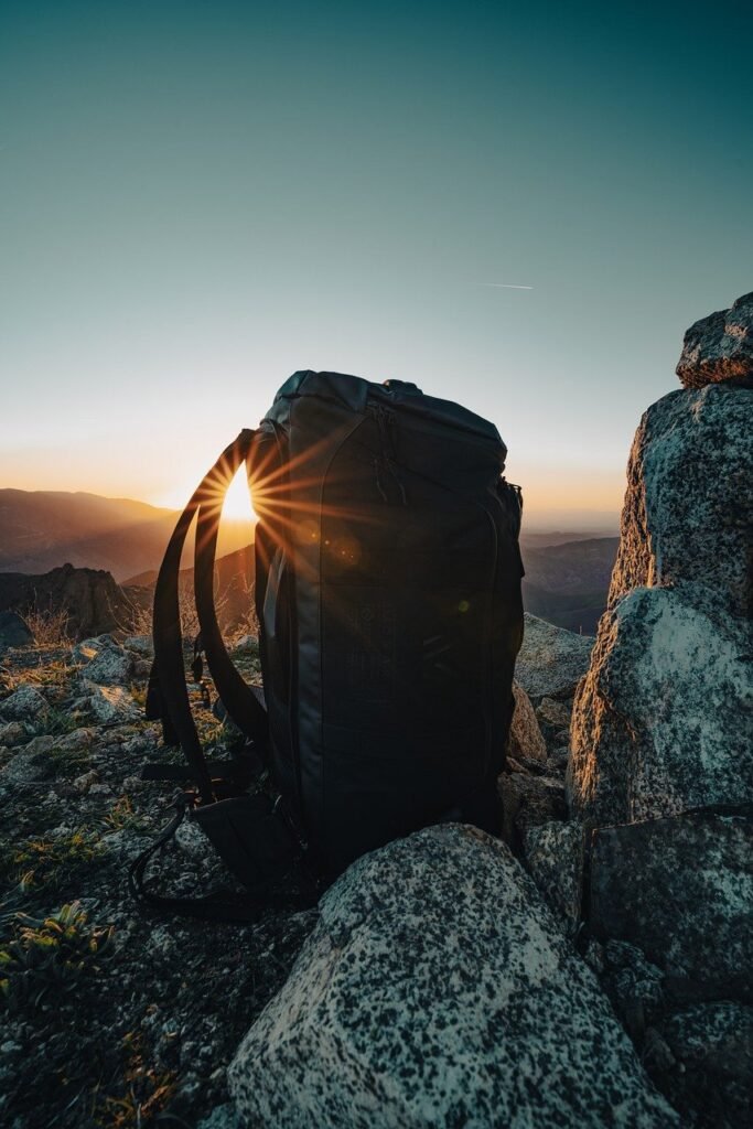 backpack, rocks, sun-7832746.jpg